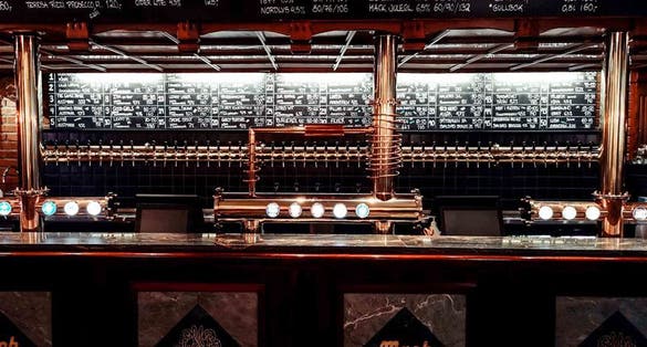 TROMSO, ARCTIC CIRCLE - NORWAY -  Tromso is a city in Tromso Municipality in Troms og Finnmark county, Norway. op Very popular pub Olhallen (brewery Mack)