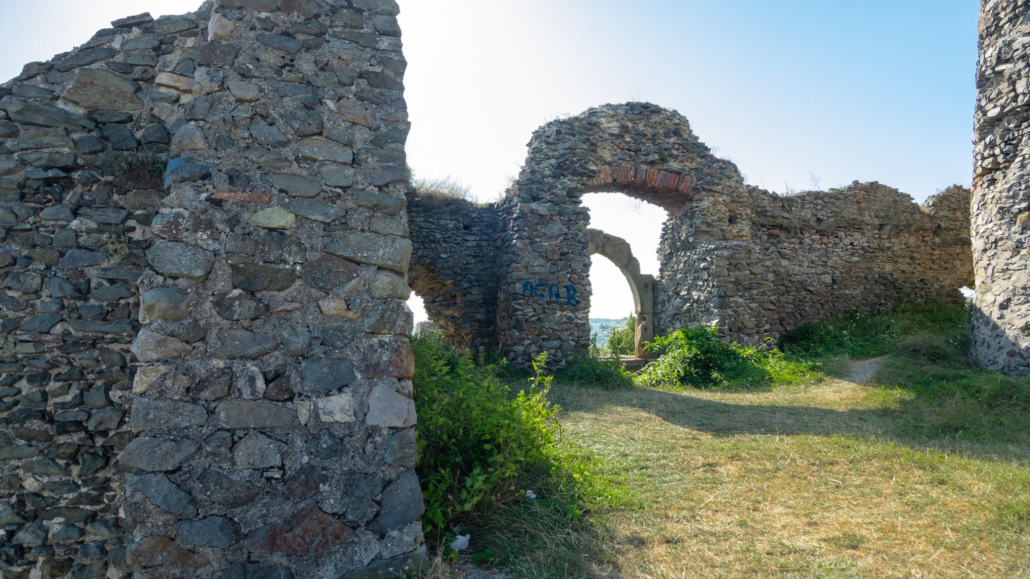 Photo of The Entrance gate of Soimos Fortress. View from the inside of the Citadel. Romania.