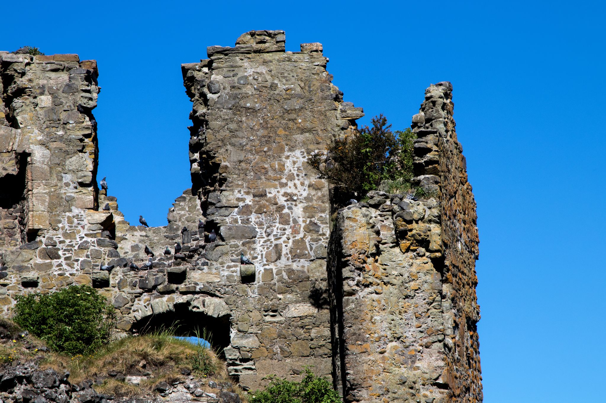 Photo of Dunure Castle on the Firth of Clyde in Scotland.