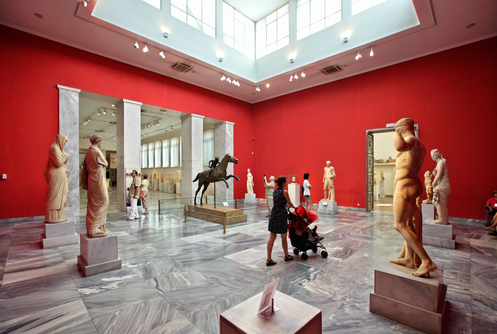 Photo of one of the halls dedicated to ancient Greek sculpture in the National Archaeological Museum of Athens.