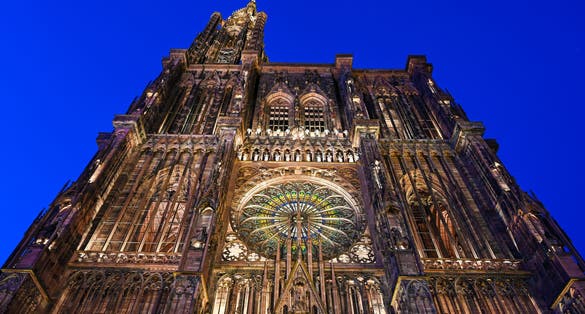 Photo of Catholic Cathedral of Our Lady of Strasbourg is city centre by night, Strasbourg, France.