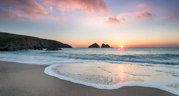 Photo of  sunset at Holywell Bay, a large sandy beach near Newquay in Cornwall.