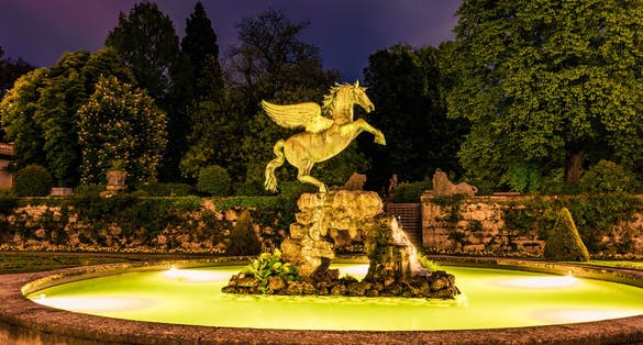 Photo of mazing night view of illuminated fountain, in the shape of horse in Mirabell Palace, Salzburg, Austria.