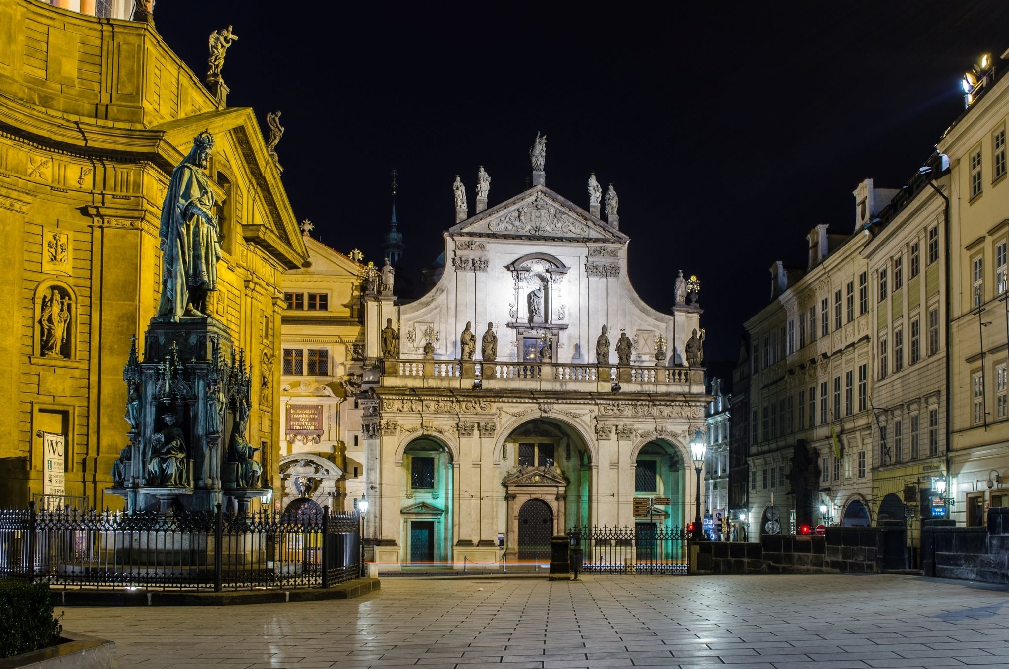Photo of night view of Crusaders church and Clementinum in Prague, Czech republic.