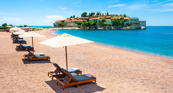 Photo of beautiful Sveti Stefan beach, Budva, Montenegro.