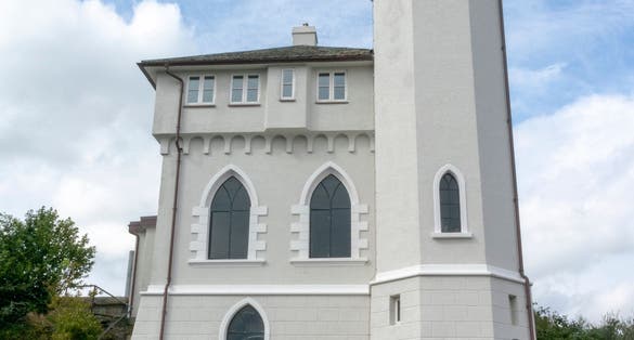 Vålandstårnet in Stavanger Norway. Old tower plased on the highest point of the city next to a water reservoir.