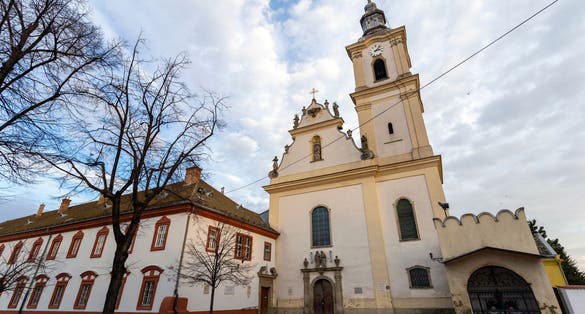 photo of view of Franciscan Church (Sarlos Boldogasszony) in Gyongyos, Hungary.