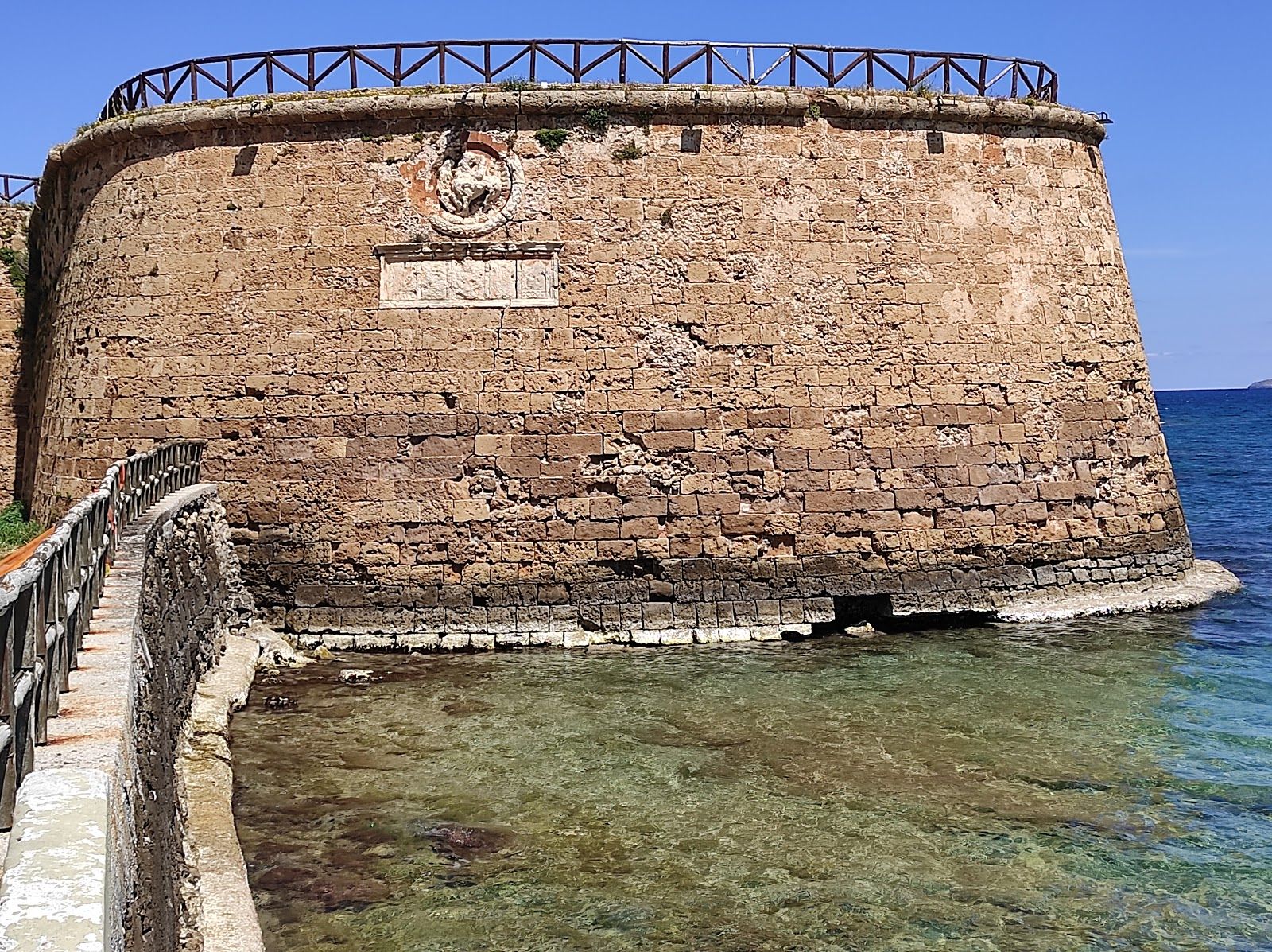 Photo of aerial view of Chania with the amazing lighthouse, mosque, venetian shipyards, Crete, Greece.