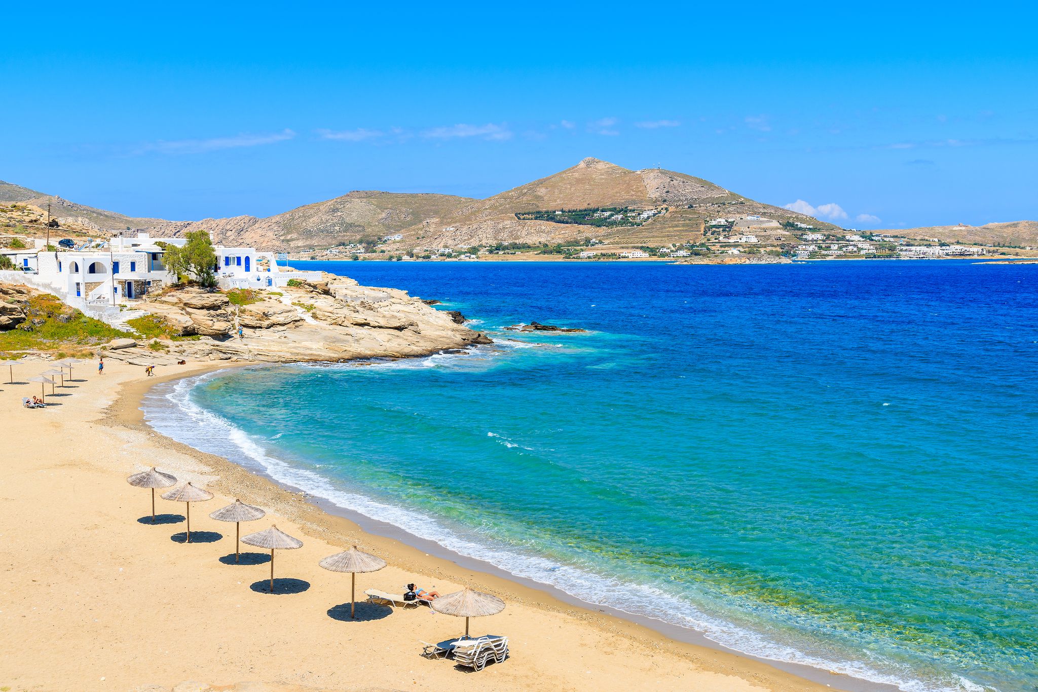 Photo of beautiful bay with beach in Naoussa village, Parikia ,Paros island, Cyclades, Greece.