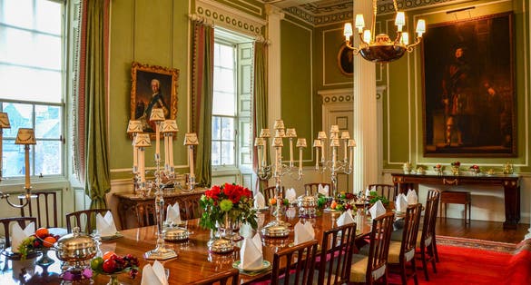 luxury interior decoration in a traditional British style dinning room of the historic Holyrood Palace.