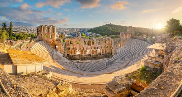 Photo of the Odeon of Herodes Atticus Roman theater structure at the Acropolis of Athens, Greece.