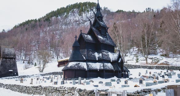 Borgund Stave Church during winter. A stave church is a medieval wooden Christian church building once common in north-western Europe.