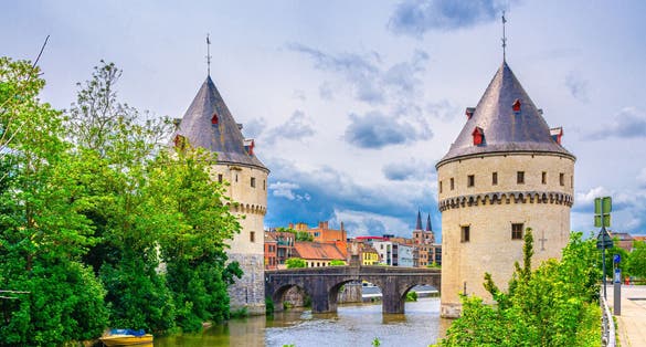 Broeltorens Broel Towers Gothic architecture style stone buildings near Broel Bridge, promenade of Lys river in Kortrijk city historical centre, Fortification towers, West Flanders province, Belgium
