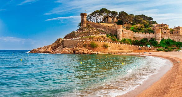 Photo of sea landscape Badia bay in Tossa de Mar in Girona, Catalonia, Spain.
