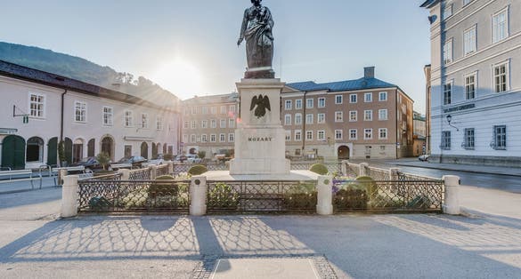 photo of view of Mozart statue on Mozart Square (Mozartplatz) located at Salzburg, Austria.