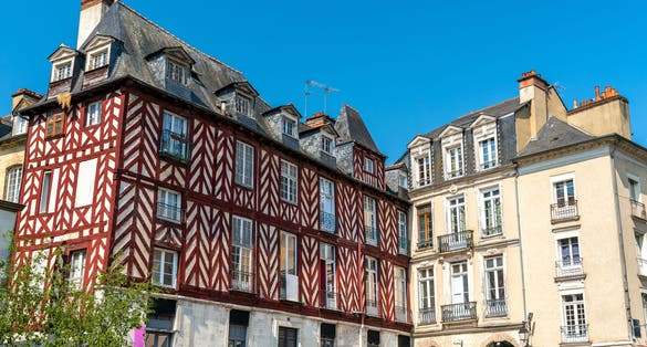 Photo of traditional half-timbered houses in the old town of Rennes ,Brittany, France.