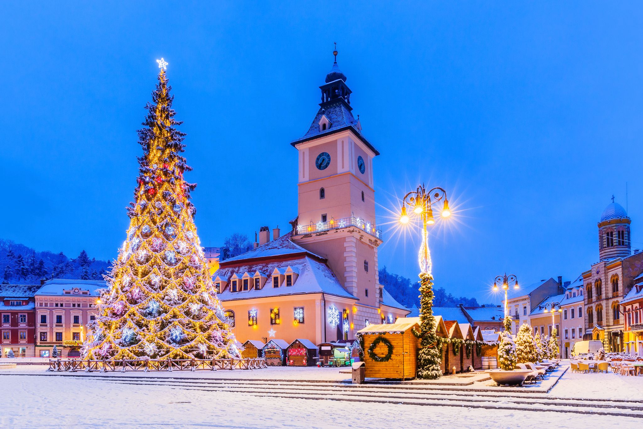 Photo of Brasov, Romania. Medieval Council House in the Main Square at winter of the Old Town.