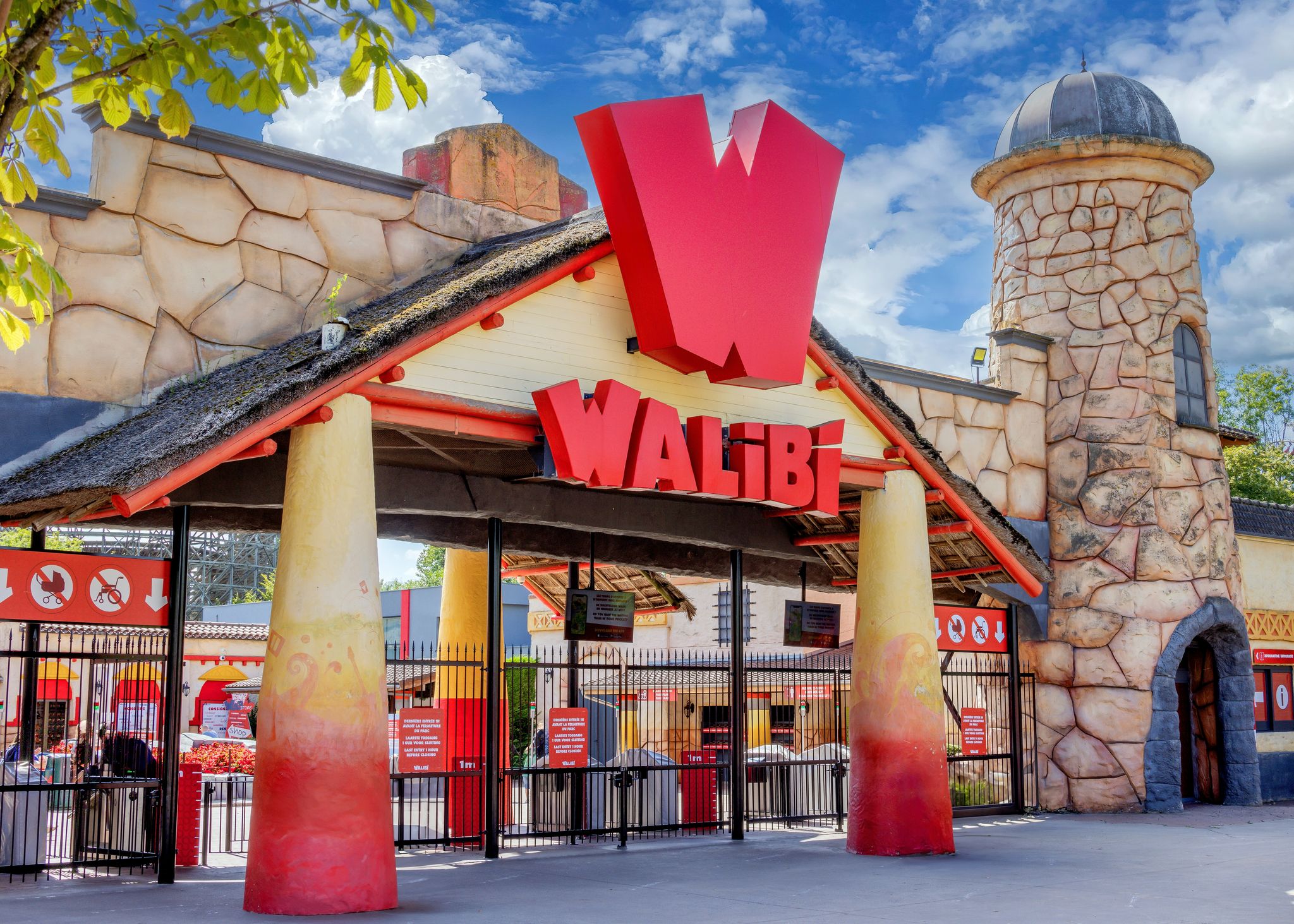 Photo of Walibi Theme Park Belgium. Tourist attraction with rollercoasters and rides.
