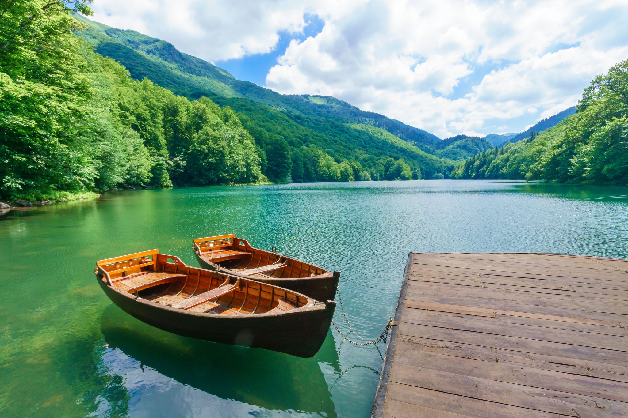 Photo of Pier and boats in Lake Biograd (Biogradsko jezero), Biogradska Gora national park, Montenegro.