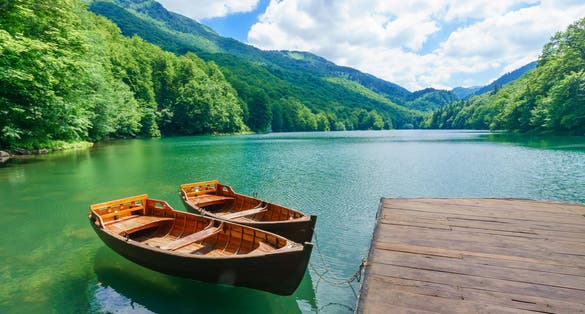 Photo of Pier and boats in Lake Biograd (Biogradsko jezero), Biogradska Gora national park, Montenegro.