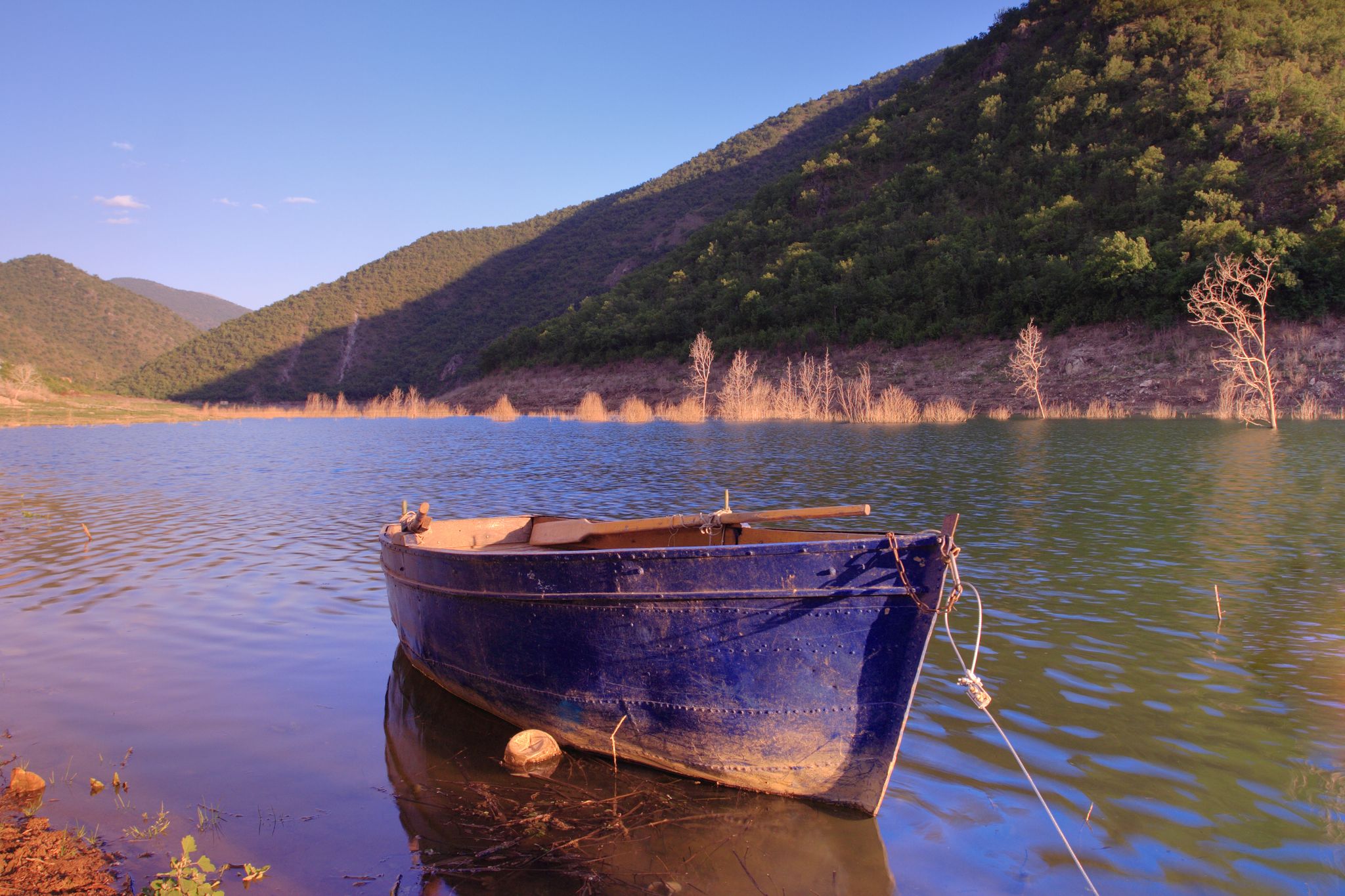 Photo of boat anchored on Kozjak lake, Macedonia.