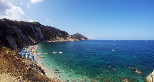 The beach of Sansone at the elba island. On the background Capo d'Enfola. Italy.