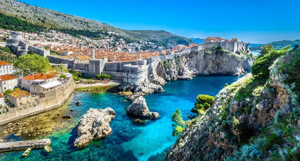 Photo of aerial panoramic view at famous European travel destination, Dubrovnik cityscape on Adriatic Coast.