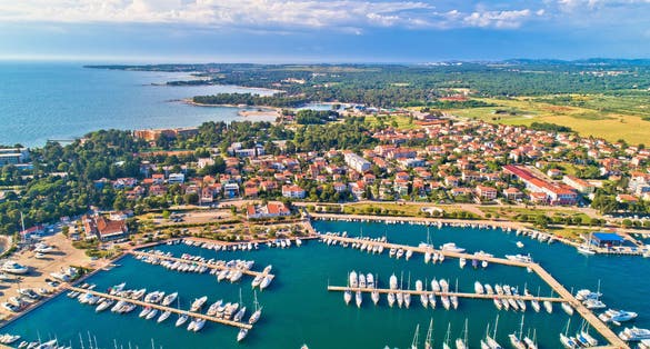 Umag. Aerial view of sailing marina and beautiful coastlne in Umag, Istria region of Croatia