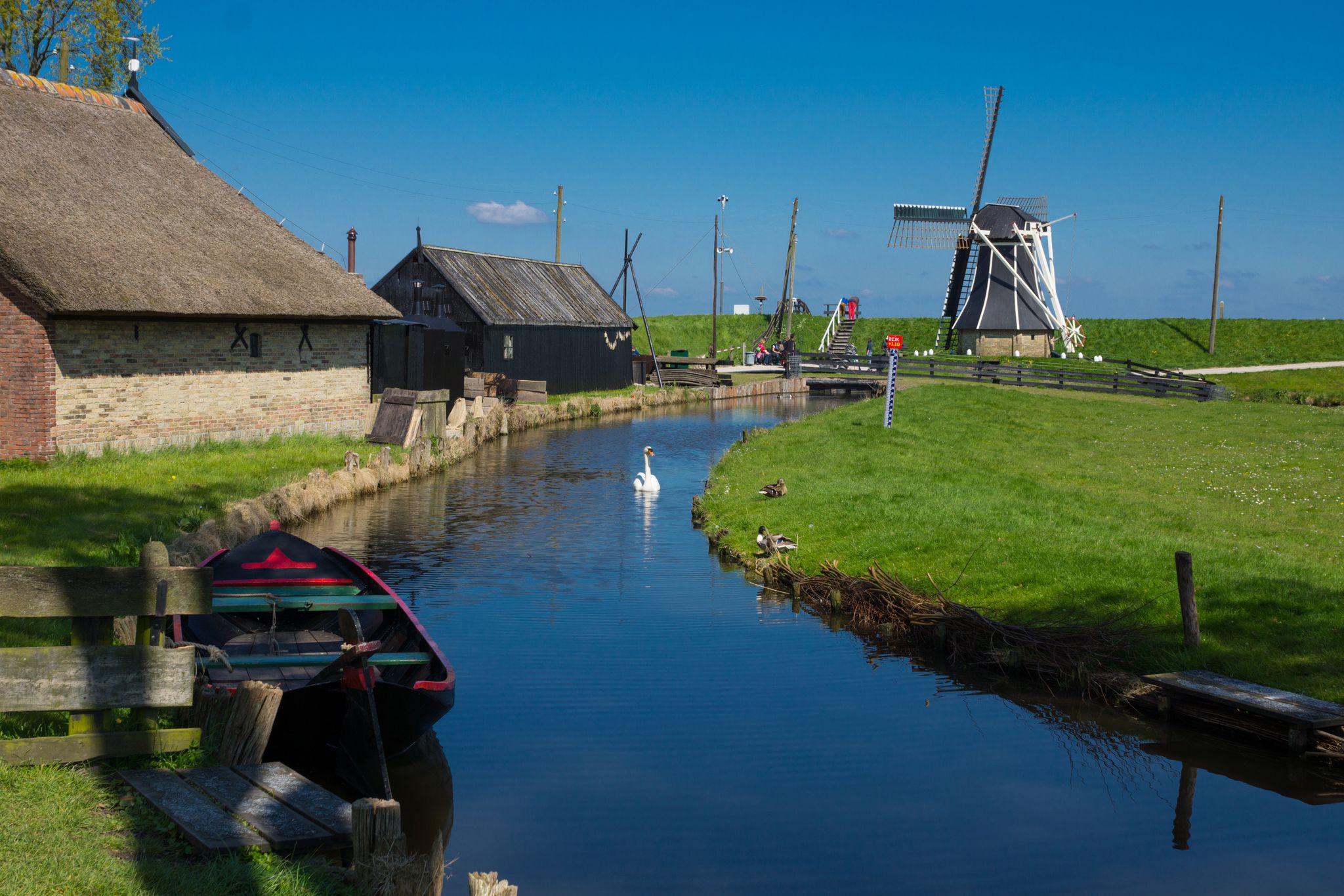 photo of traditional Dutch village in the museum of Zuiderzee (Zuiderzeemuseum), Enkhuizen, the Netherlands.