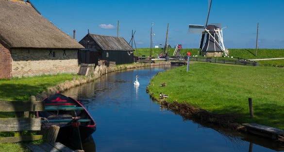 photo of traditional Dutch village in the museum of Zuiderzee (Zuiderzeemuseum), Enkhuizen, the Netherlands.