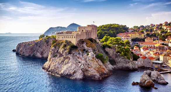 Photo of the general view of Dubrovnik, Fortresses Lovrijenac and Bokar seen from south old walls, Croatia.