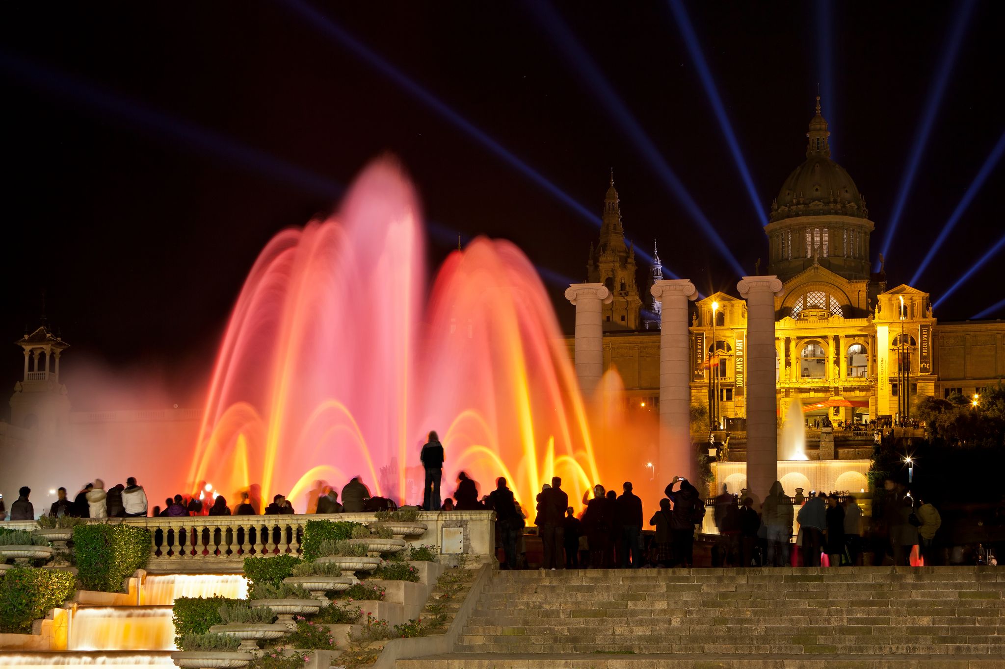 photo of night view of magic fountain show of Montjuïc, Barcelona, Spain.