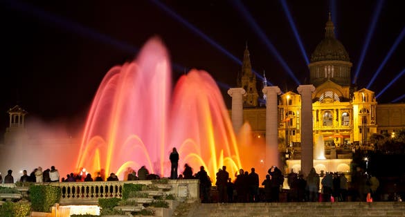 photo of night view of magic fountain show of Montjuïc, Barcelona, Spain.