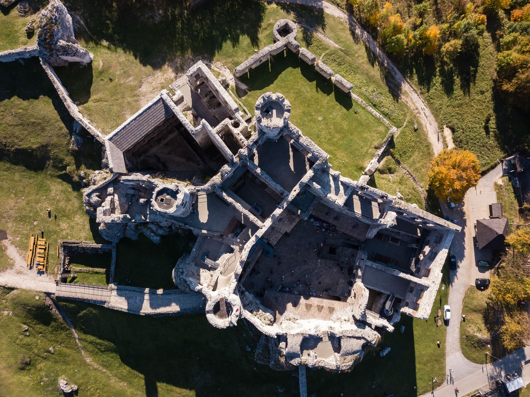 Photo of aerial view ruins of medieval castle on the rock in Ogrodzieniec, Poland.