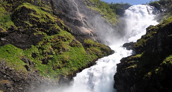 Photo of giant Kjosfossen waterfall by the Flåm to Myrdal Railway Line, Norway.