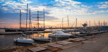 Photo of aerial view of The Cathedral of the Assumption and Varna city at amazing sunset, Bulgaria.