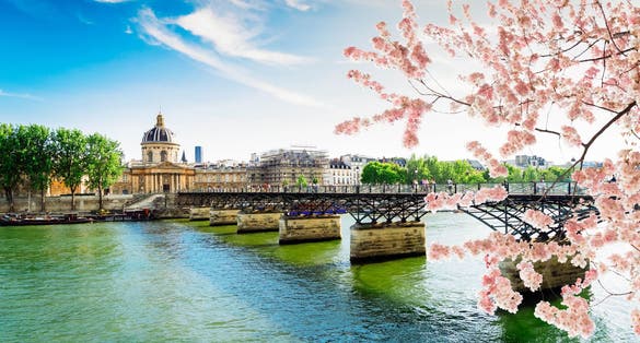 photo of the famous Pont des Arts at beautiful morning in Paris, France.