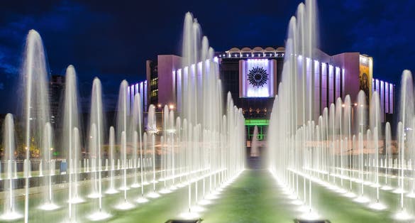 Photo of night scene fountains in front of the National Palace of Culture, Sofia, Bulgaria.