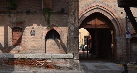 photo of view of Wooden beam portico of Palazzo Grassi palace in Bologna, Italy.