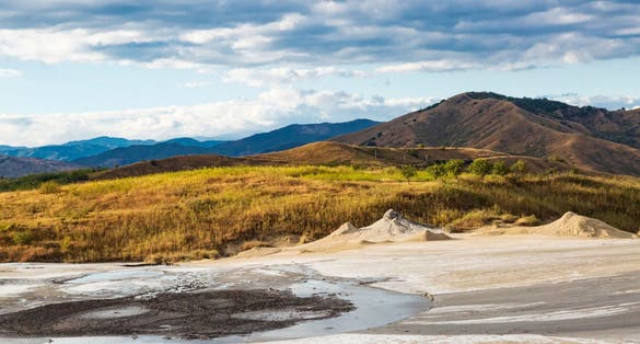 Romania, Buzău County, Berca. Geological ,botanical reservation Vulcanii Noroioși de la Paclele Mici. Small volcano-shaped structures caused by eruption of natural gases.