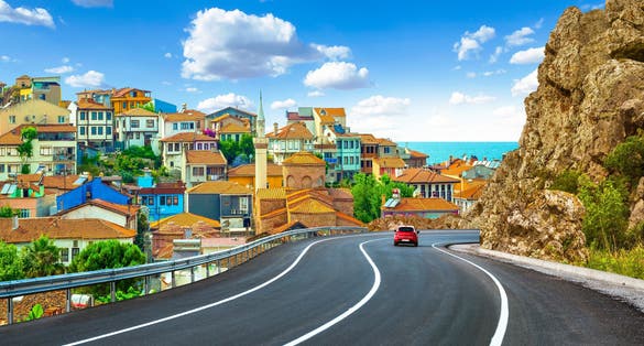 road landscape in the city. Turkey travel in summer. Highway view in beautiful city. Car driving on the road in city. Travel view in asian cities. Highway landscape in summer. Bursa, Turkey.