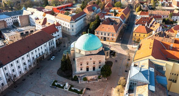photo of view of Aerial photo about the Szechenyi square in Pecs city Hungary. Amazing view with the downtown's church what name is Dzsami.