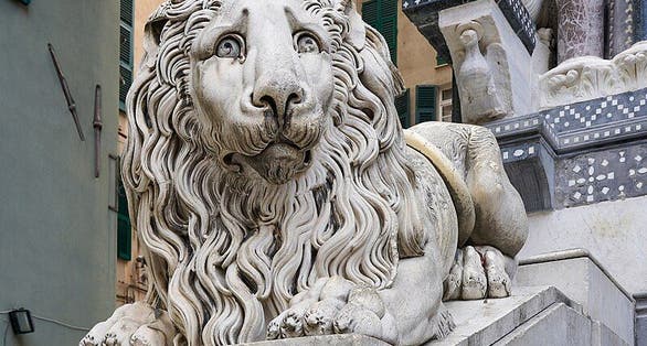photo of view of the Lion on left of entrance stairs, Genoa, Italy.
