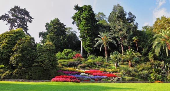 Magnificent park with fountains, statues, flower beds. Lake Como, Villa Carlotta