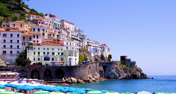 Photo of Colorful view over the beach at Amalfi, Italy.