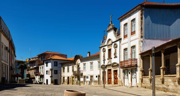 Photo of old streets of Portuguese city Mirandela under clear sky.