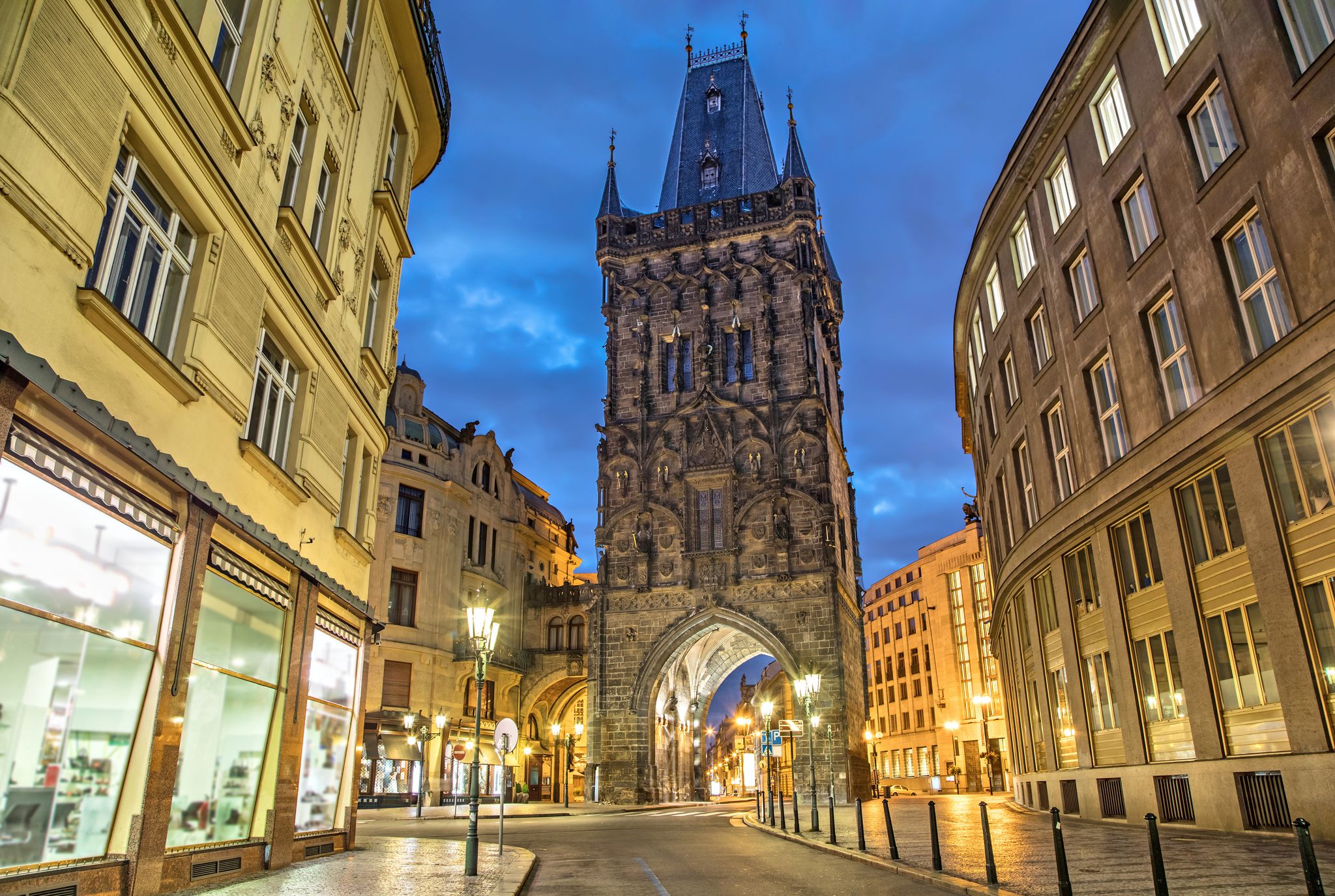 Photo of the Powder Tower by night medieval gothic city gate in Prague, Czech Republic.