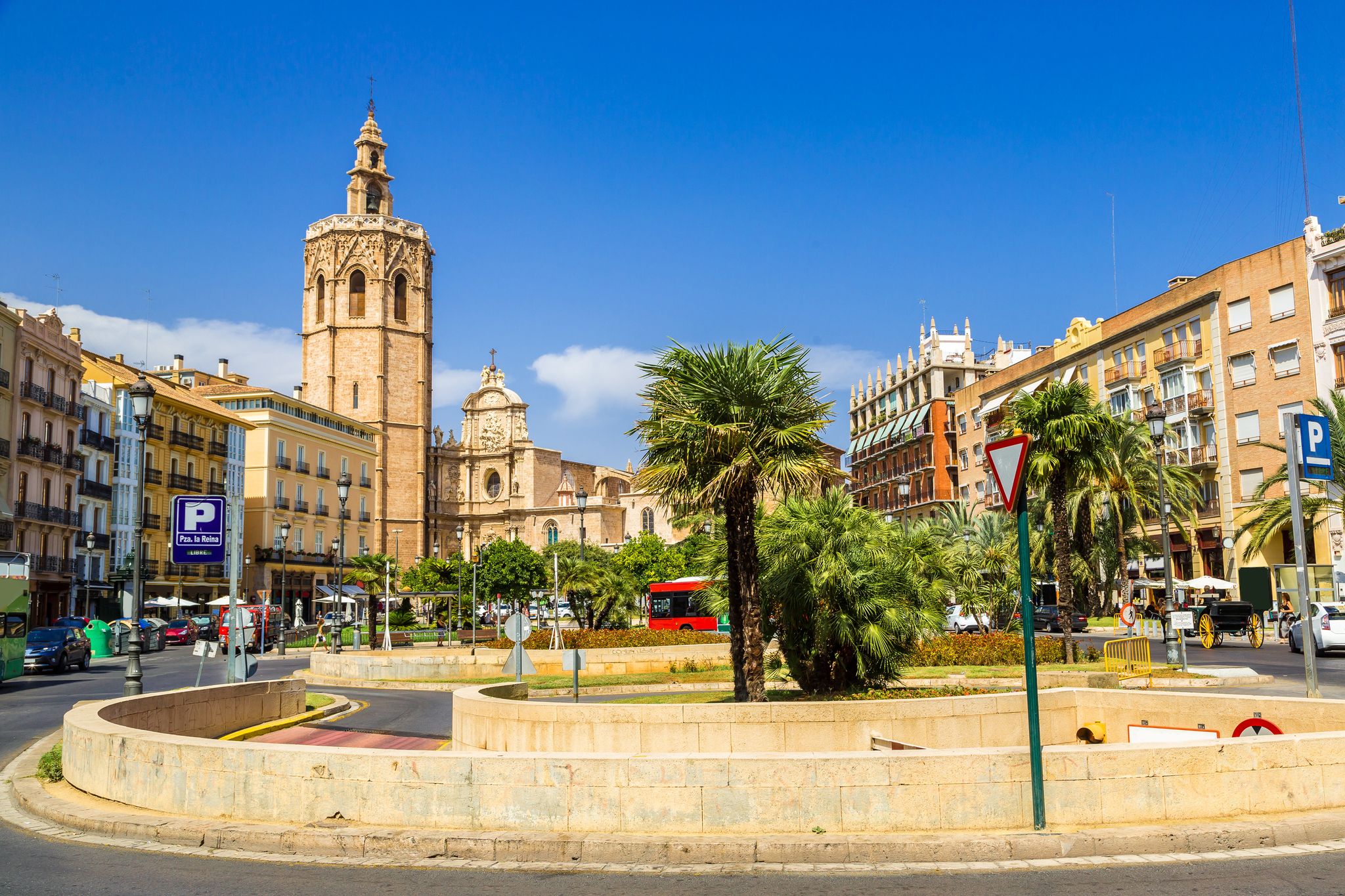 Photo of Bell tower and Valencia Cathedral in Valencia in a summer day, Spain .