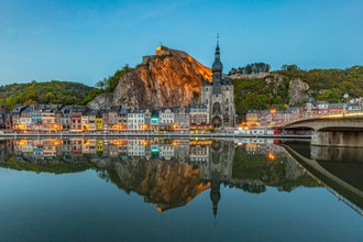 Classic view of the historic town of Dinant with scenic River Meuse in beautiful golden evening light at sunset, province of Namur, Wallonia, Belgium