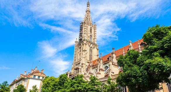 photo of Bern Minster or Berner Munster is a Swiss Reformed cathedral in the old city of Bern in Switzerland.